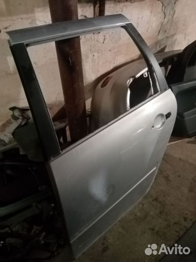 Дверь задняя левая на калину универсал