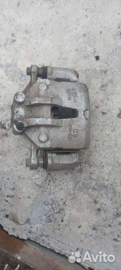 Передний левый суппорт Kia Cerato