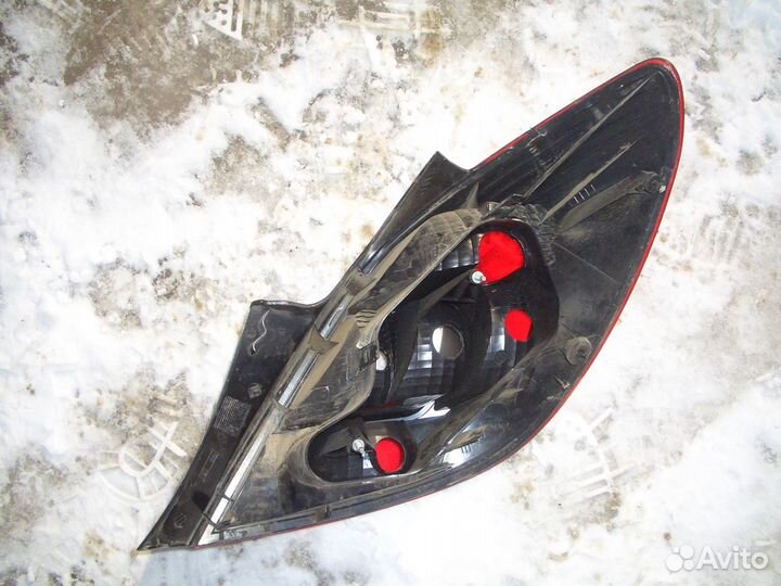 Фонарь левый Опель Корса D с06-15г