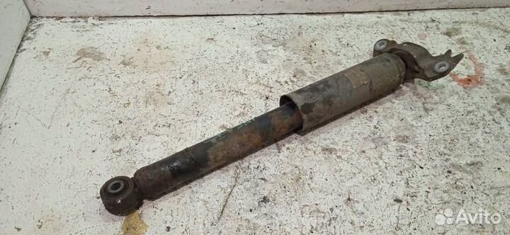 Амортизатор задний левый