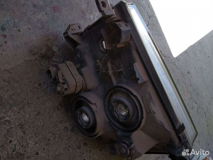 Фара левая Toyota Land Cruiser 100