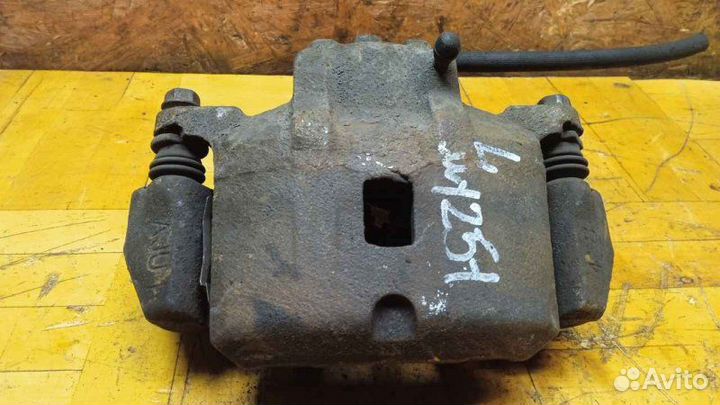 Суппорт передний левый Mitsubishi Lancer 9 1.3