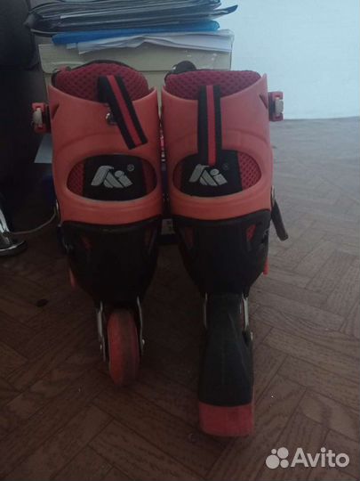 Роликовые коньки