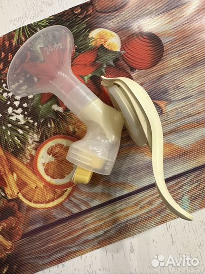 Молокоотсос medela ручной