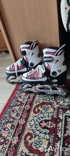 Роликовые коньки