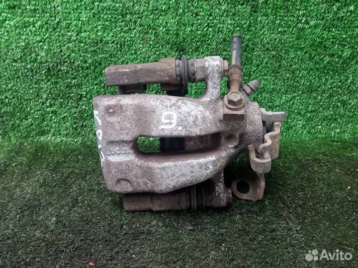 Суппорт задний левый Opel Astra H (2004-2014)