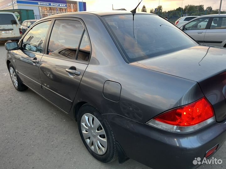 Mitsubishi Lancer 1.6 МТ, 2009, 199 129 км