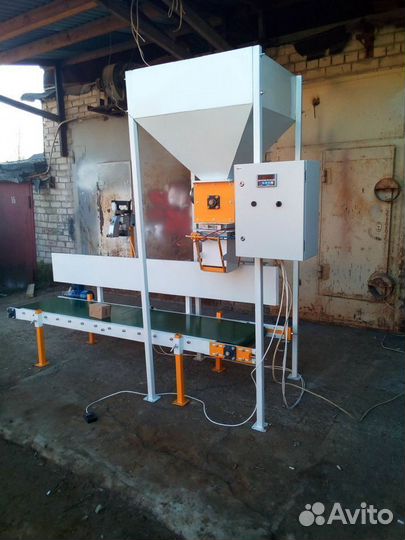 Упаковщик дозатор весовой фасовщик в мешки пакеты