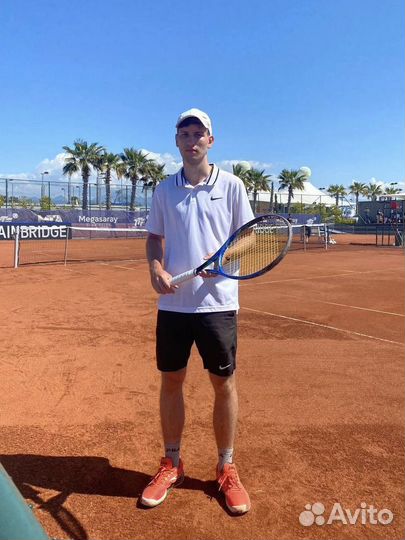 Тренер по большому теннису