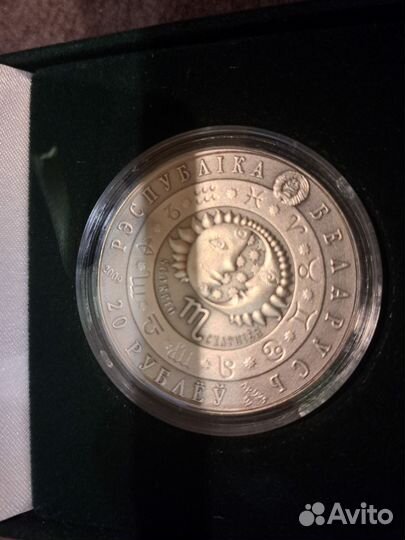 Монета скорпион