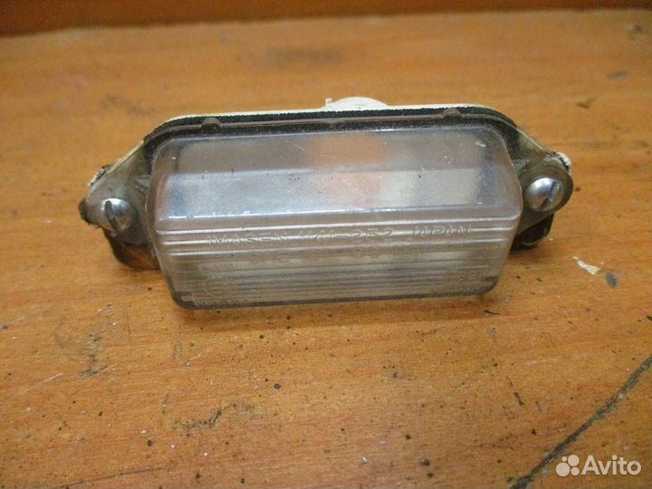 Фонарь подсветки номера Mitsubishi Lancer 10 (CX