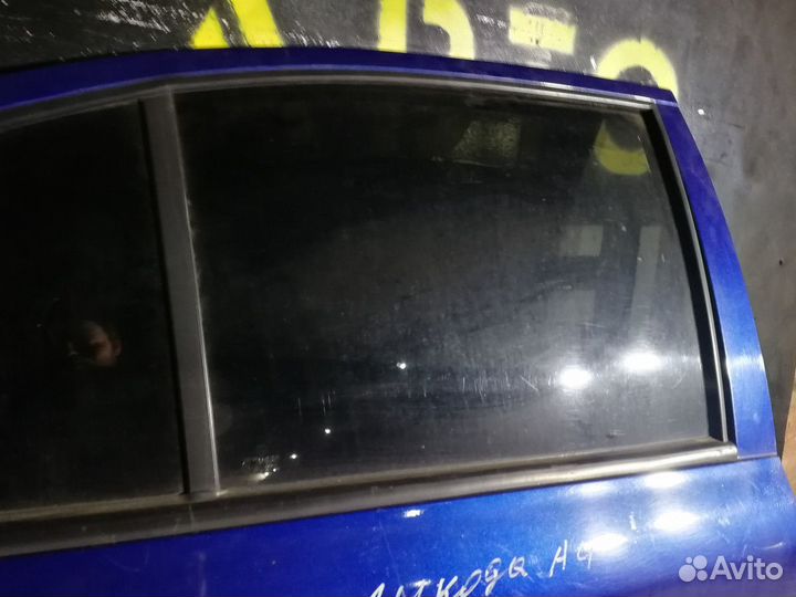 Стекло двери задней правой Skoda Octavia A4