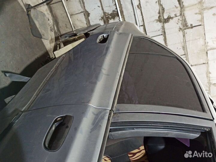 Дверь задняя правая серебристая Хундай Акцент