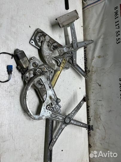 Передний левый электро стеклоподъемник bmw e34