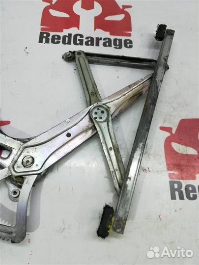 Стеклоподъемник передний левый Mitsubishi L200