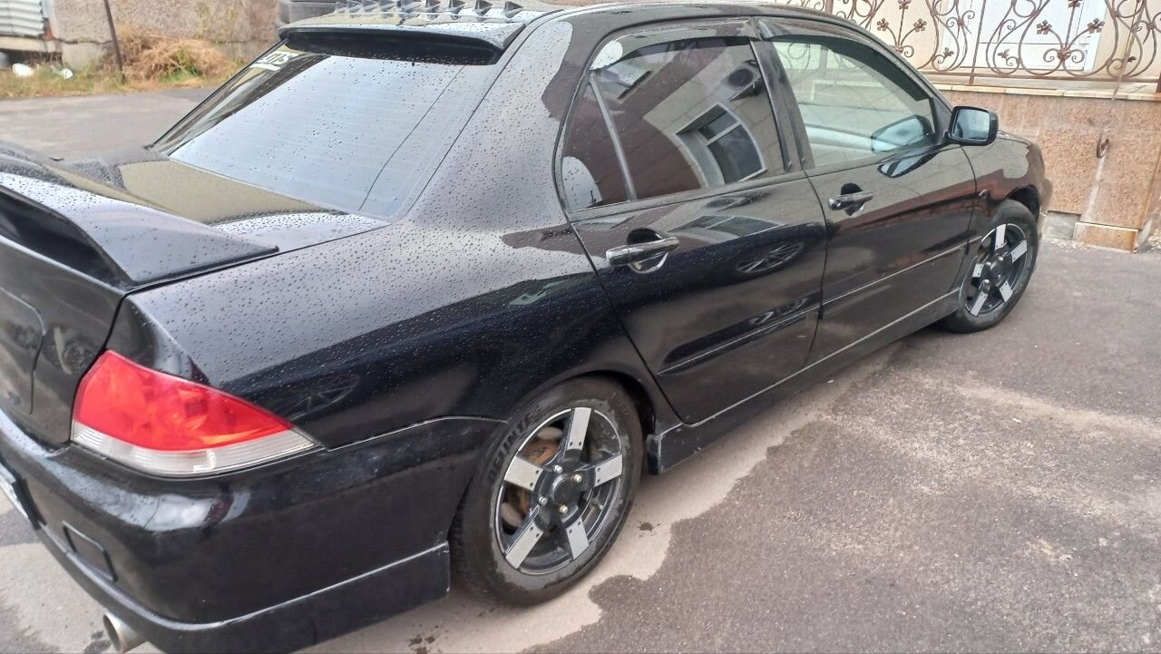 Mitsubishi Lancer: фото владельца