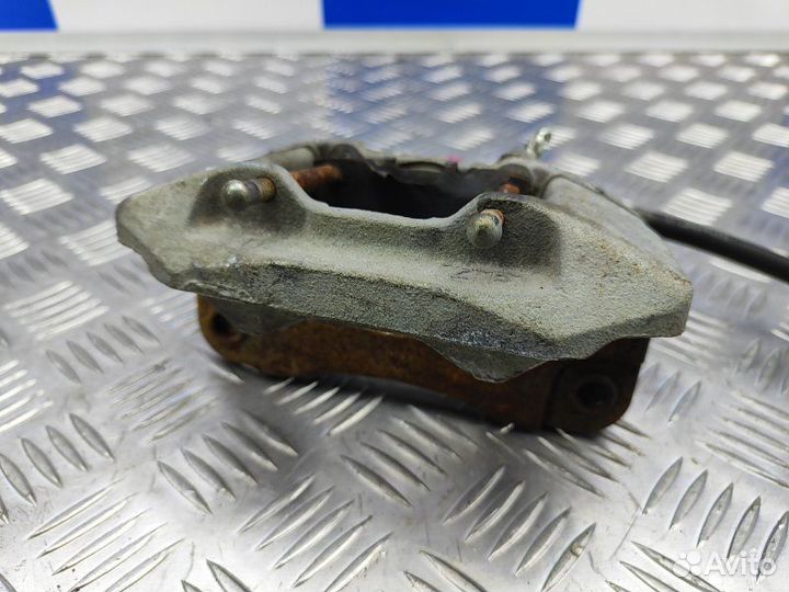 Суппорт задний правый Mitsubishi Pajero Sport 2