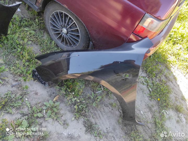 Крыло левое mazda 3 bk