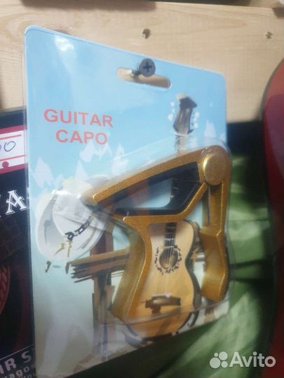 Каподастр для гитары золотистый