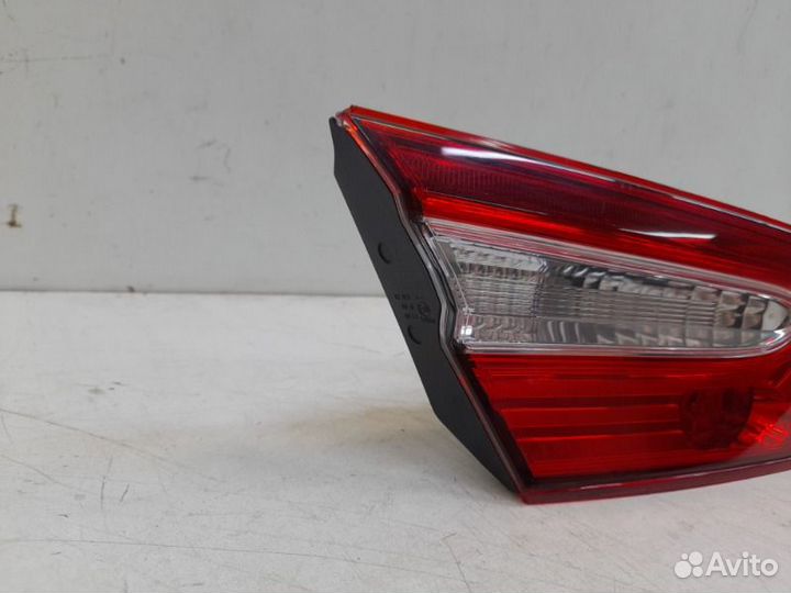 Фонарь в крышку багажника левый Toyota Camry XV70