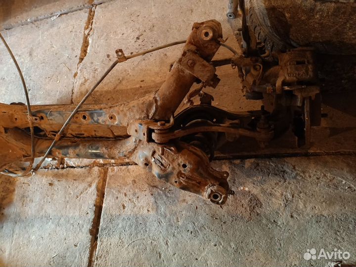 Подрамник в сборе с рычагами mazda 6gh