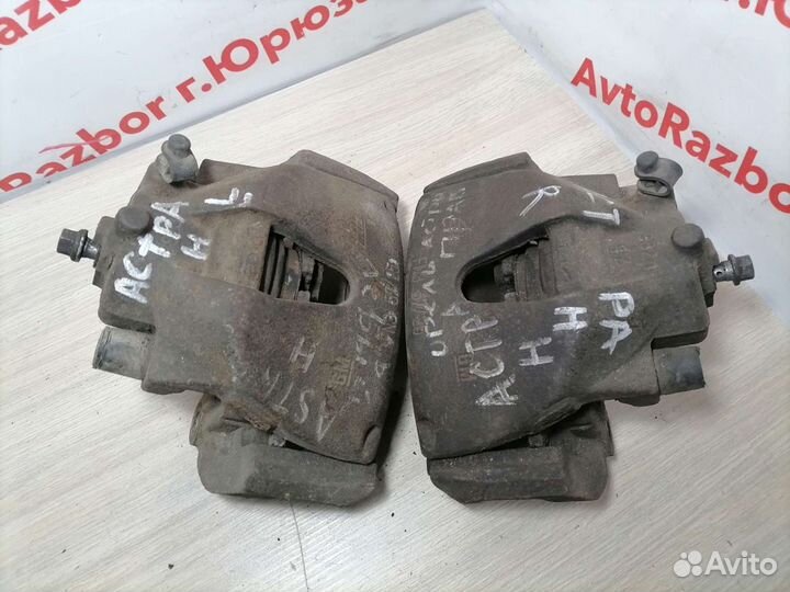 Суппорт передний Opel Astra H