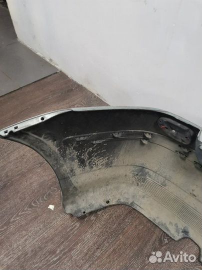 Бампер задний Nissan Tino