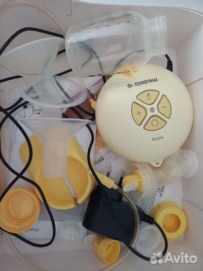 Молокоотсос электрический medela swing