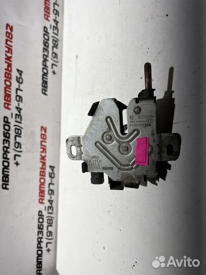 Замок капота Ford Focus 1