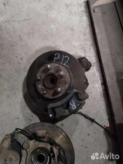 Кулак поворотный передний Nissan Primera P12