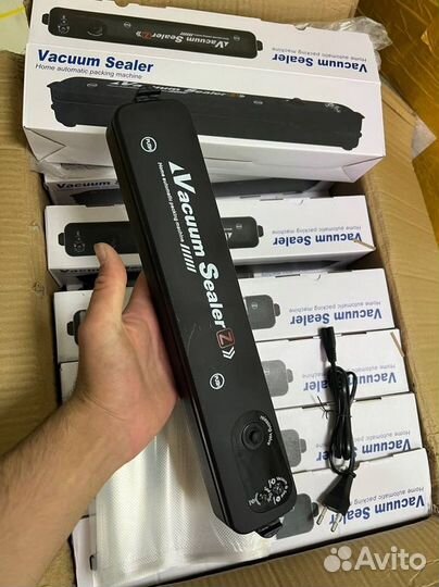 Вакуумный упаковщик