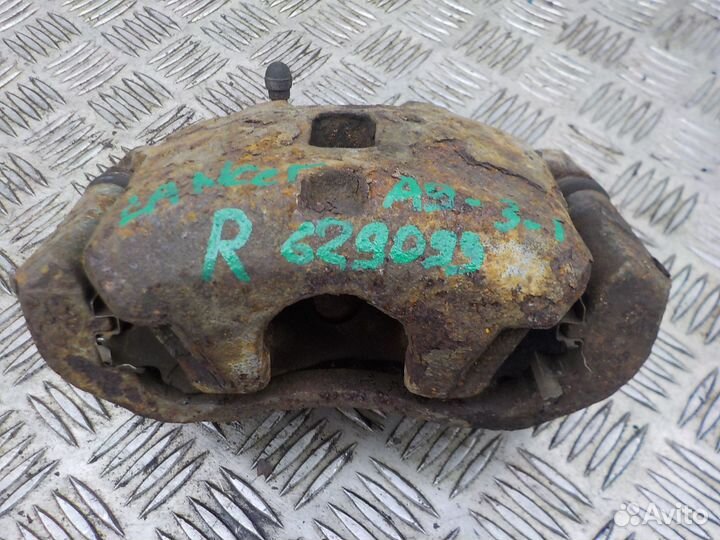 Суппорт тормозной передний правый Mitsubishi Lance