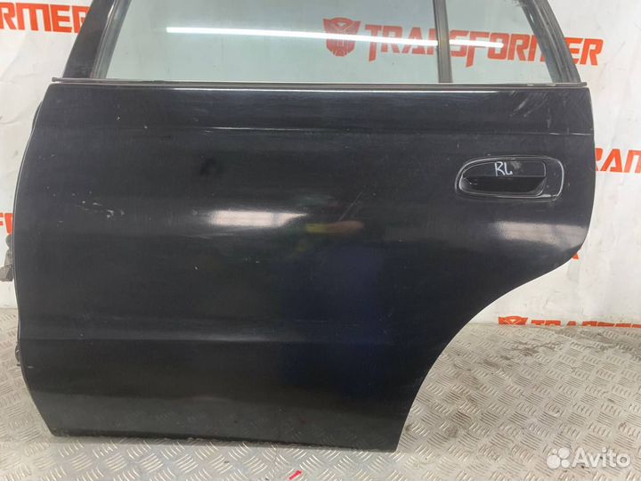 Дверь задняя левая Тойота Калдина