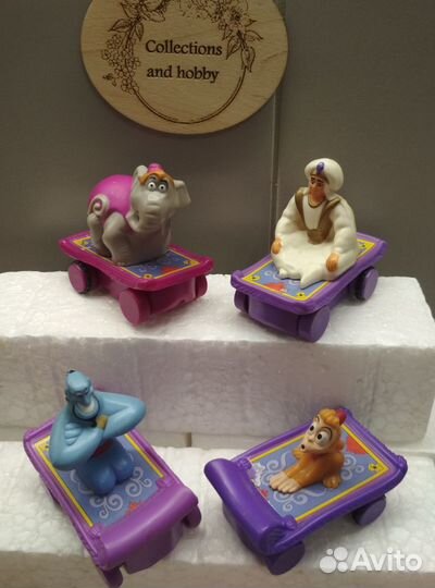 Макдональдс игрушки: тролли, Алладин, смурфы
