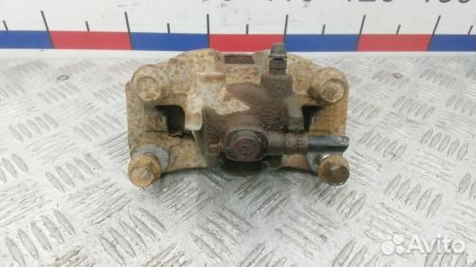 Суппорт тормозной задний левый mitsubishi pajero 4