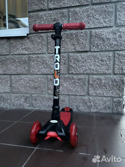 Самокат trolo б/у с святящими колесами