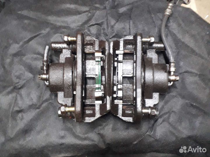 Суппорт передний Mazda 626