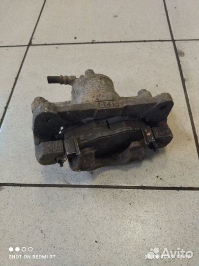 Суппорт тормозной передний левый Daewoo Matiz