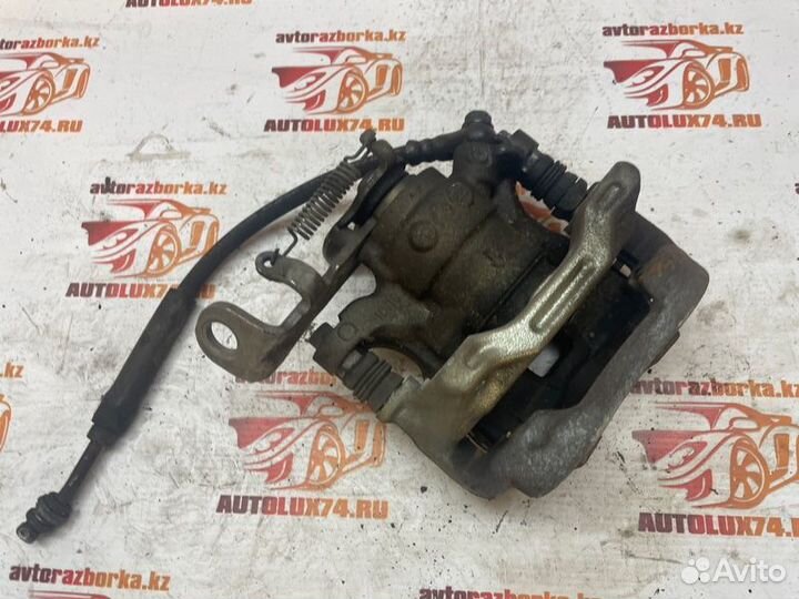 Суппорт тормозной задний правый Mazda 3 BM хетчбек