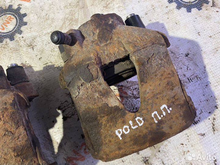 Суппорт передний VW Polo 1.4