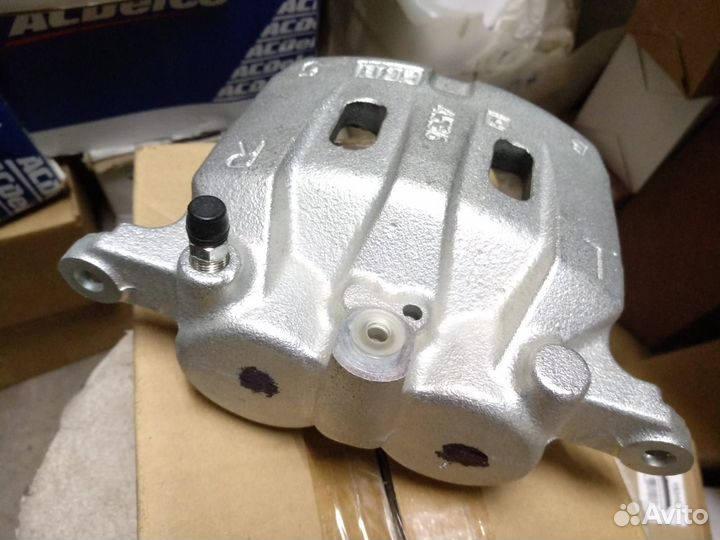 Тормозной суппорт перед, Шевроле Трелблезер с 2012