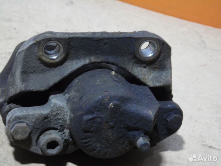 Суппорт тормозной передний правый Рено Логан