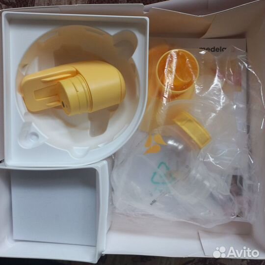 Молокоотсос Medela mini electric