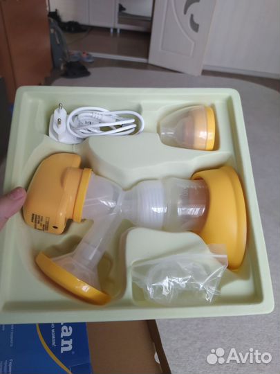 Молокоотсос электрический новый