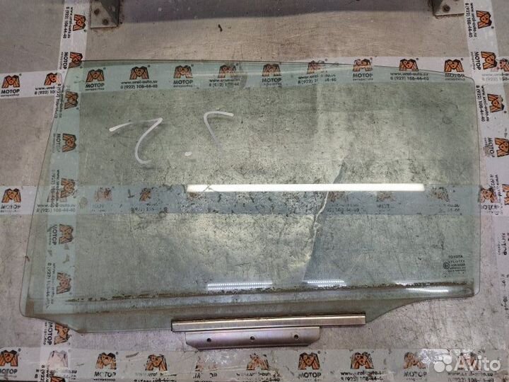 Стекло двери заднее левое Toyota Corolla E12 1.6