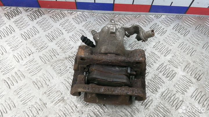 Суппорт задний правый Opel Astra H 2006