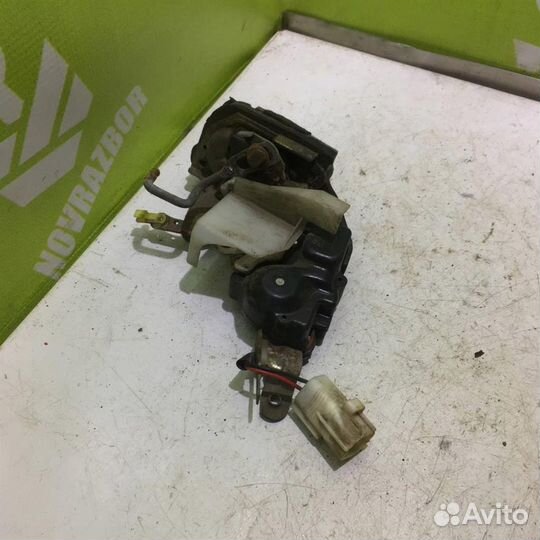 Замок двери задней левой Тойота Королла Е100