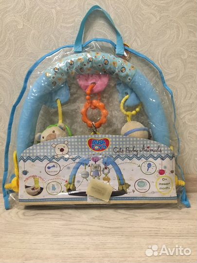 Дуга с игрушками погремушка