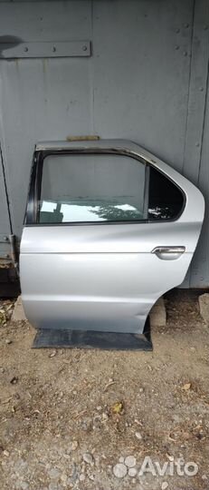 Дверь левая задняя Nissan R'nessa, цвет KLO