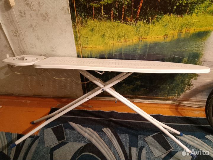 Гладильная доска с розеткой